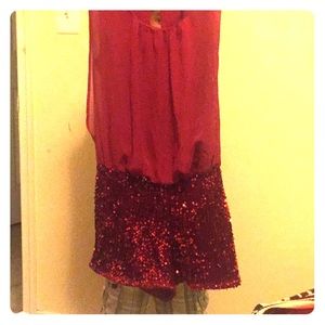 A sexy red romper short set with beautiful sequins